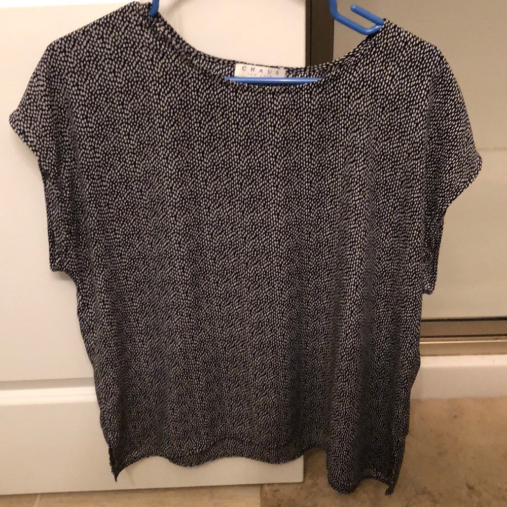 Abstract black and white polka dot top.